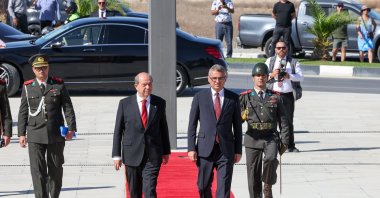 TRNC President Tufan Erhürman (R) is seen with former President Ersin Tatar at the presidency, Nicosia (Lefkoşa), TRNC, Oct. 24, 2025. (AA Photo)