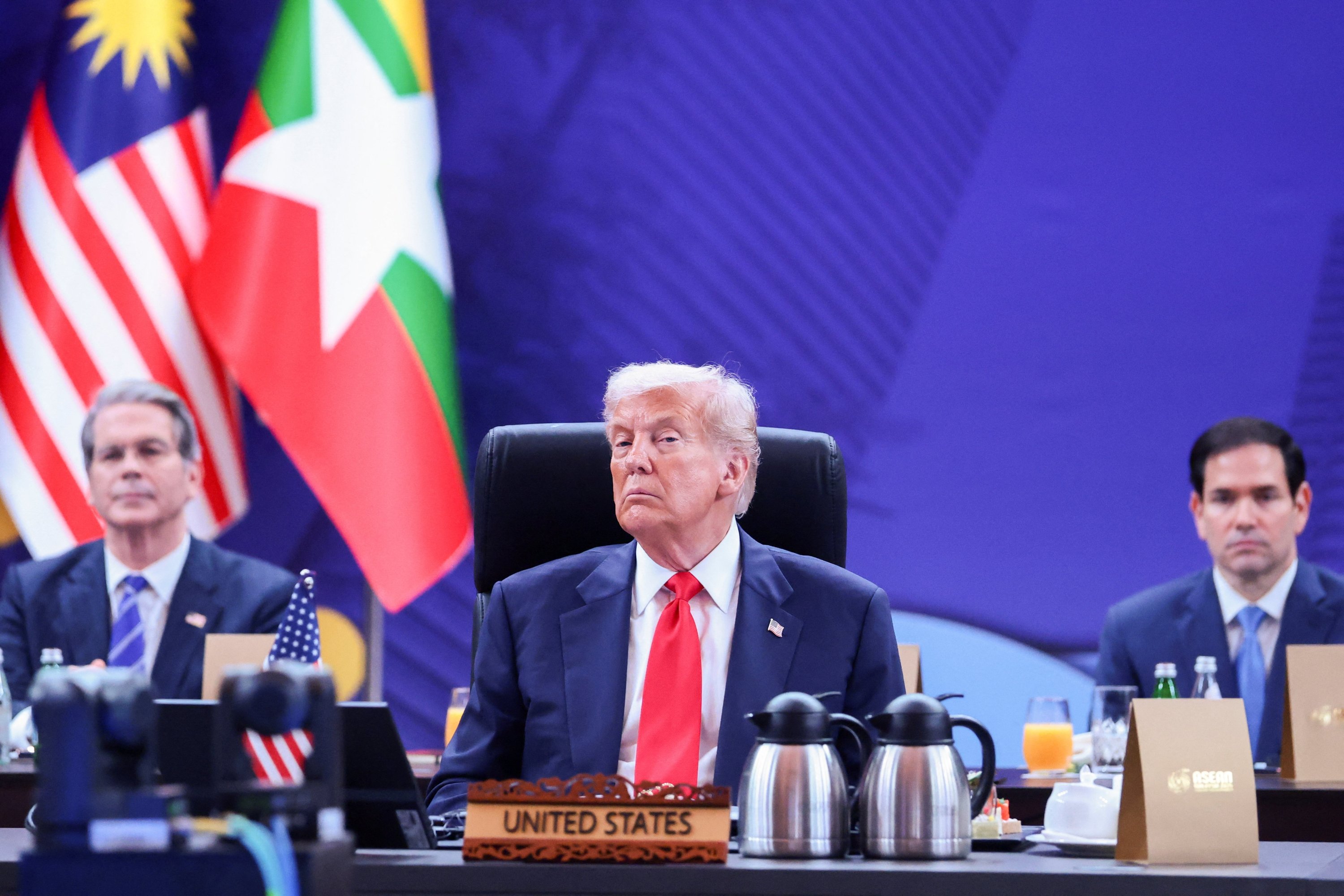 Trump kicks off key Asian tour with flurry of trade deals, talks