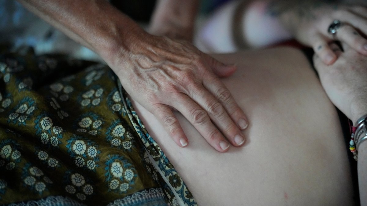 A pregnant patient is examined in Summertown, Tenn., U.S., Aug. 31, 2023. (AP Photo)