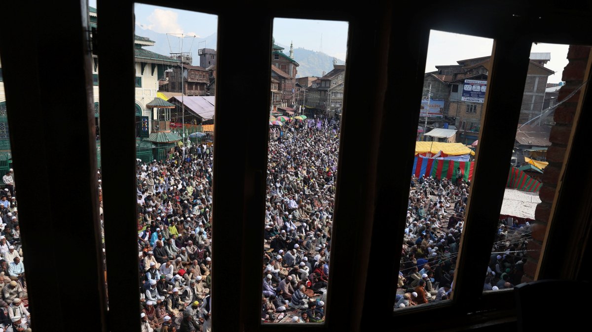 Muslim devotees offer prayers outside the shrine of Muslim preacher and Sufi saint, Sheikh Syed Abdul Qadir Jeelani, Srinagar, Kashmir, Oct. 10, 2025. (EPA Photo)