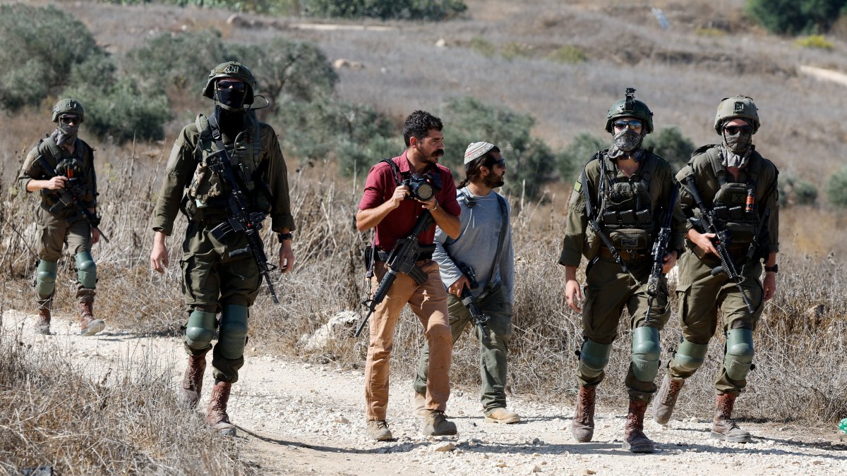 13 Palestinians injured in escalating Israeli settler attacks in West Bank