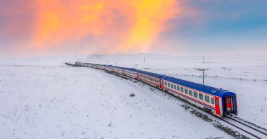 The Tourist Eastern Express passes through snowy landscapes, Kars, Türkiye, Dec. 21, 2023. (Shutterstock Photo)