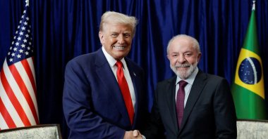 U.S. President Donald Trump and Brazilian President Luiz Inacio Lula da Silva shake hands as they meet on the sidelines of the 47th Association of Southeast Asian Nations (ASEAN) summit in Kuala Lumpur, Malaysia, Oct. 26, 2025. (Reuters Photo)