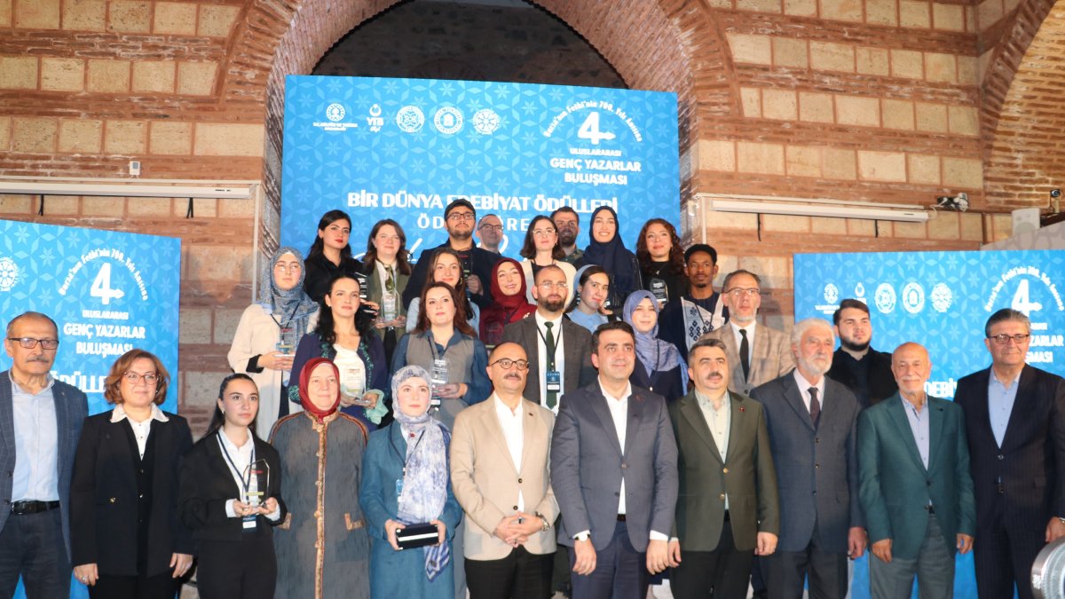 Young writers pose for a group photo after the One World Literature Awards, Bursa, Türkiye, Oct. 26, 2025. (AA Photo)