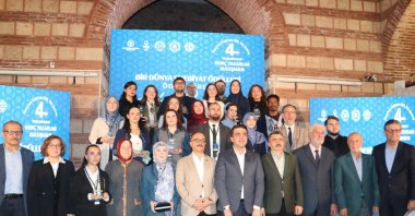 Young writers pose for a group photo after the One World Literature Awards, Bursa, Türkiye, Oct. 26, 2025. (AA Photo)