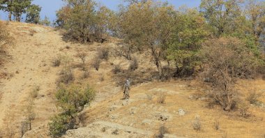 A PKK terrorist is seen somewhere in the Qandil mountains, Iraq, Oct. 26, 2025. (Reuters Photo)