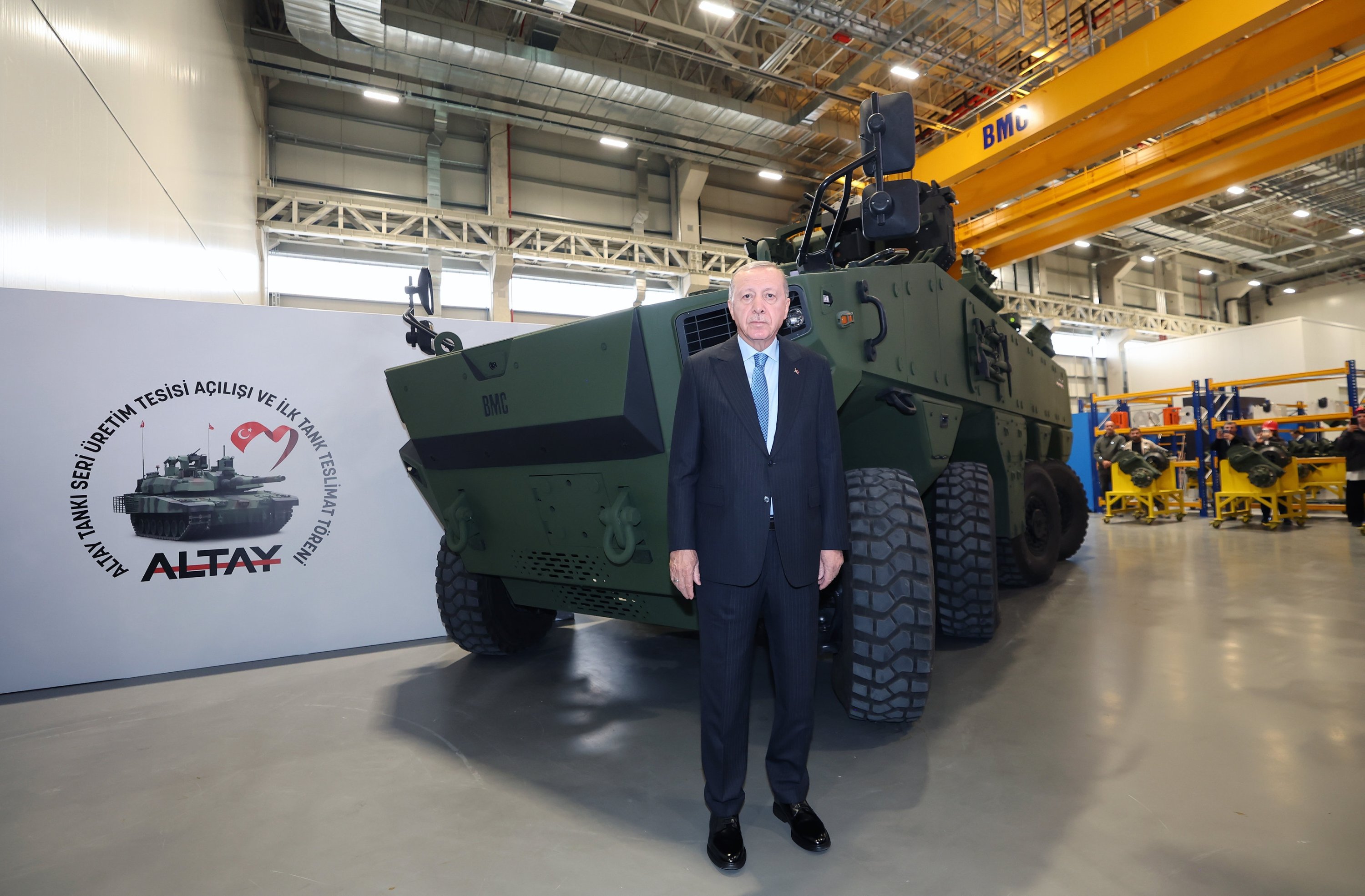 President Recep Tayyip Erdoğan poses beside the Altuğ 8x8 next-generation armored combat vehicle, Ankara, Türkiye, Oct. 28, 2025. (AA Photo)