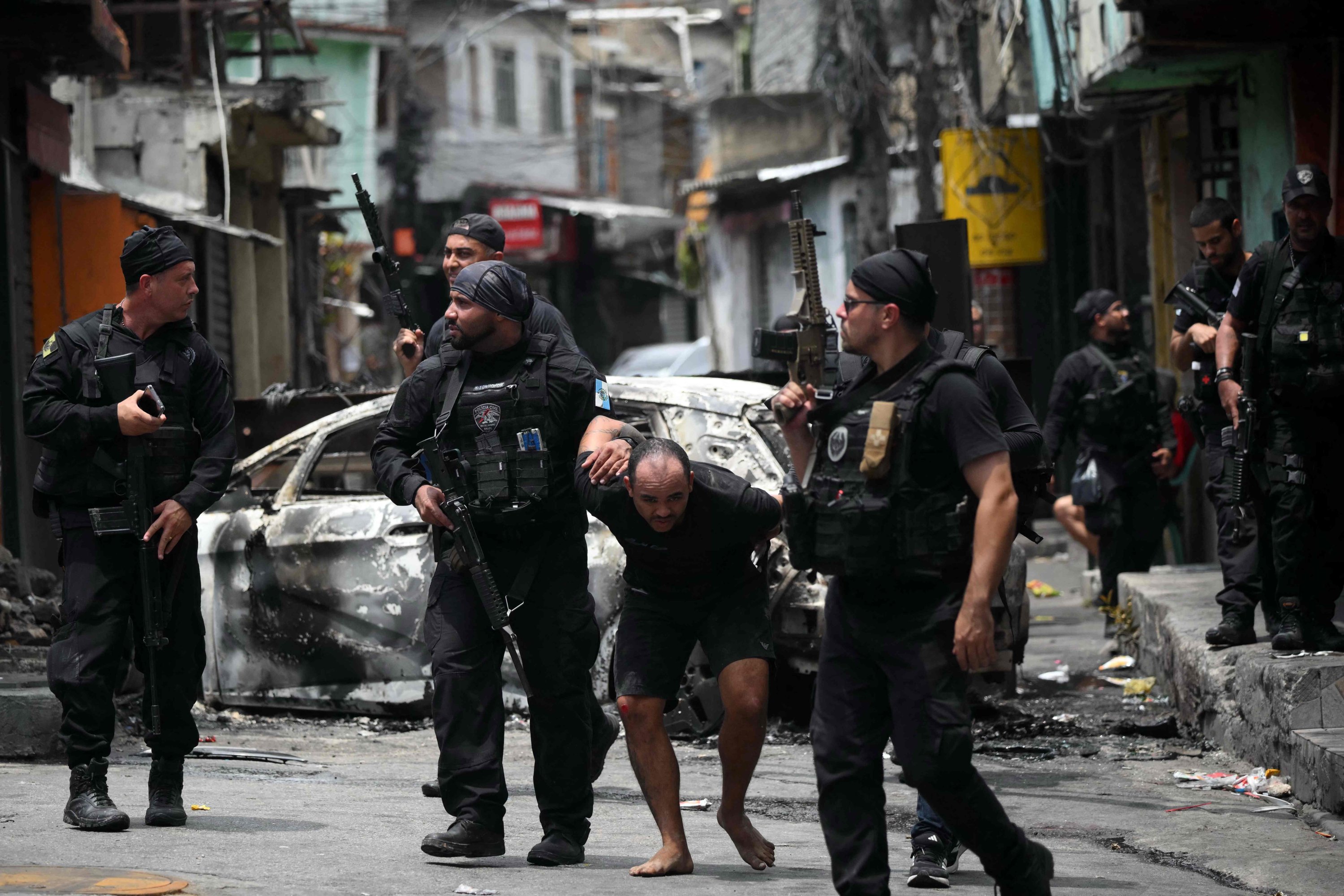 At least 64 killed in huge, war-like Rio de Janeiro drug raids