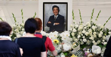 Mourners offer flowers and prayers for the late Japanese Prime Minister Shinzo Abe, who was shot while campaigning for a parliamentary election in 2022, in Tokyo, Japan, July 8, 2023. (Reuters Photo)