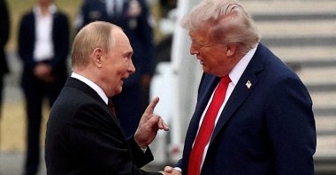 U.S. President Donald Trump shakes hand with Russian President Vladimir Putin, as they meet to negotiate for an end to the war in Ukraine, at Joint Base Elmendorf-Richardson in Anchorage, Alaska, U.S., Aug.15, 2025. (Reuters File Photo)