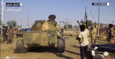 Fighters of Sudan&#039;s Rapid Support Forces celebrate in the streets of el-Fasher in Darfur, Sudan, Oct. 26, 2025. (AFP Photo)