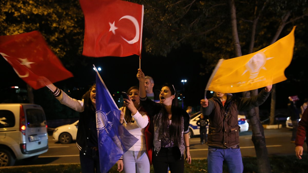 AK Party supporters wave flags of the party and Türkiye to celebrate an election win, Istanbul, Türkiye, Nov. 1, 2015. (AP Photo)
