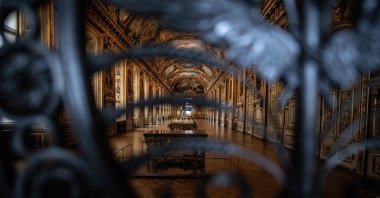 The closed gate of the &quot;Apollo&#039;s Gallery&quot; and the French Crown Jewels, at the Louvre Museum, Paris, France, Jan. 8, 2021. (AFP Photo)