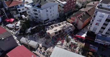 An aerial view of the seven-story building that collapsed, showing ongoing rescue efforts and the evacuated area in Gebze, Kocaeli, Türkiye, Oct. 29, 2025. (AA Photo)