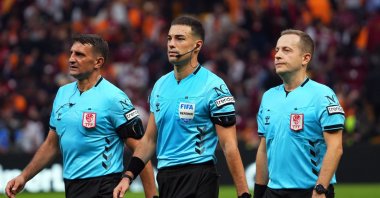 Turkish referee Oğuzhan Çakır (C) and his assistants are seen during a match between Göztepe and Galatasaray, Istanbul, Türkiye, Oct. 27, 2025. (IHA Photo)