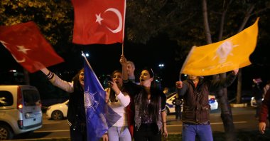 AK Party supporters wave flags of the party and Türkiye to celebrate an election win, Istanbul, Türkiye, Nov. 1, 2015. (AP Photo)