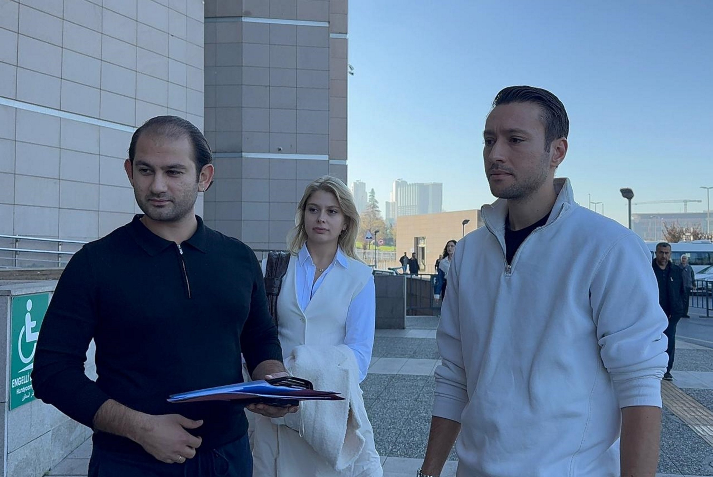 Referee Zorbay Küçük (R) arrives with his lawyer to file a criminal complaint at the Istanbul Courthouse, Istanbul, Türkiye, Oct. 30, 2025. (AA Photo)