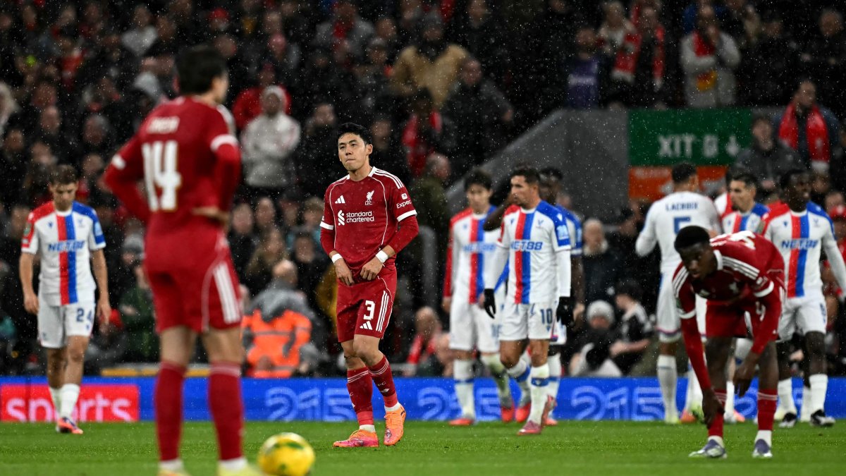 Liverpool's Wataru Endo (2nd L) reacts after Crystal Palace scores during the English League Cup fourth-round football match between Liverpool and Crystal Palace at Anfield, Liverpool, U.K., Oct. 29, 2025. (AFP Photo)