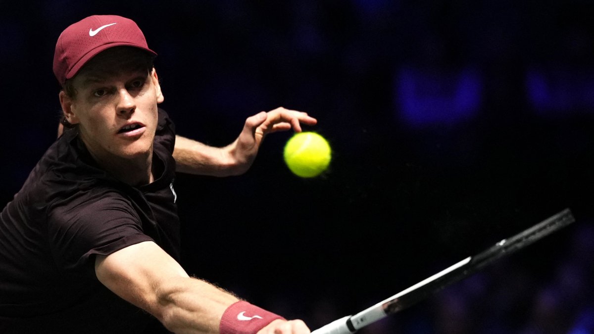 Italy&#039;s Jannik Sinner plays a backhand return to Belgium&#039;s Zizou Bergs during their men&#039;s singles match on day three of the Paris ATP Masters 1000 tennis tournament at the Paris La Defense Arena in Nanterre, Paris, France, Oct. 29, 2025. (AFP Photo)