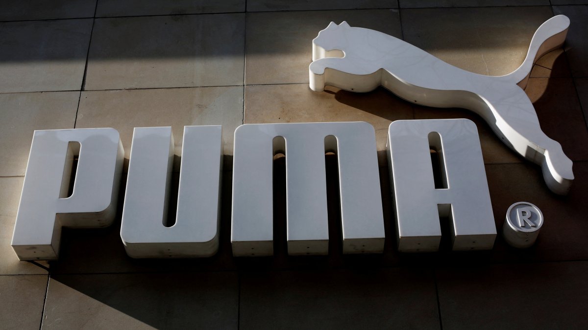 The logo of German sports goods firm Puma is seen at the entrance of one of its stores in Vienna, Austria, March 18, 2016. (Reuters Photo)