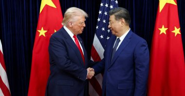 U.S. President Donald Trump shakes hands with Chinese President Xi Jinping as they hold a bilateral meeting at Gimhae International Airport, on the sidelines of the Asia-Pacific Economic Cooperation (APEC) summit, in Busan, South Korea, Oct. 30, 2025. (Reuters Photo)