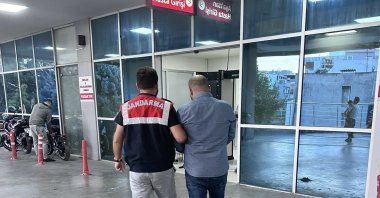 A Daesh suspect is arrested by security forces, western Izmir province, Türkiye, Oct. 30, 2025. (IHA Photo)