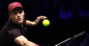 Italy&#039;s Jannik Sinner plays a backhand return to Belgium&#039;s Zizou Bergs during their men&#039;s singles match on day three of the Paris ATP Masters 1000 tennis tournament at the Paris La Defense Arena in Nanterre, Paris, France, Oct. 29, 2025. (AFP Photo)