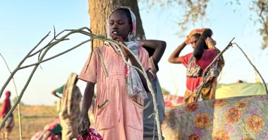 Displaced Sudanese who fled el-Fasher after the city fell to the RSF, rest near the town of Tawila in war-torn western Darfur region, Sudan, Oct. 28, 2025. (AFP Photo)