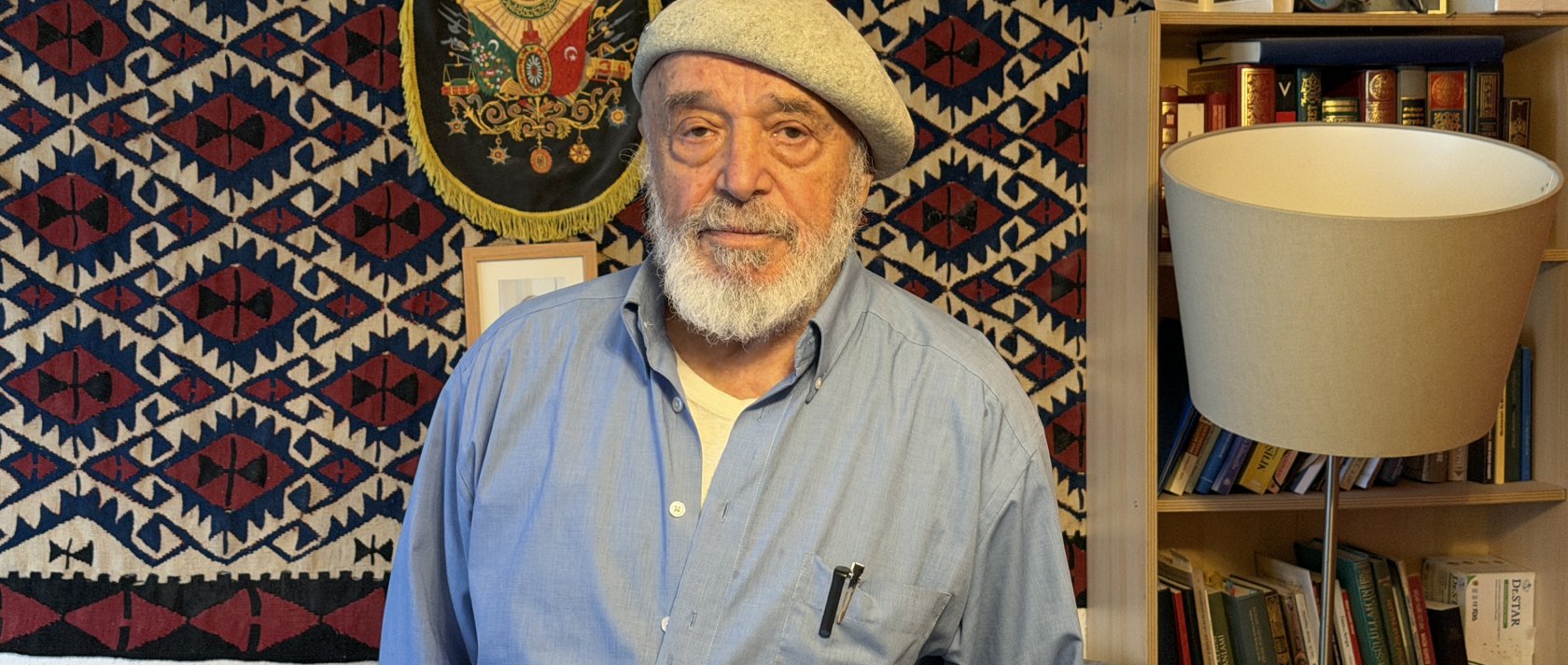 Şefik Karagüzel, 91, poses for an interview, Cologne, Germany, Oct. 30, 2025. (AA Photo)