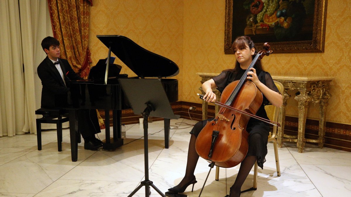 Pianist Batu Meriçtan and cellist Başak Canseli Çiftci perform during a reception hosted by the Turkish Embassy to the Vatican at the Parco dei Principi Hotel, marking the 102nd anniversary of the founding of the Republic of Türkiye, Rome, Italy, Oct. 29, 2025. (AA Photo)