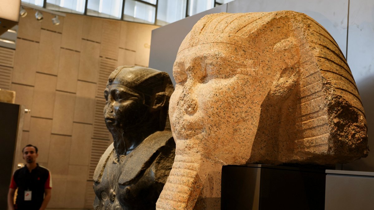 A man looks at exhibits at the Grand Egyptian Museum (GEM), scheduled to officially open on Nov. 1, 2025, following a partial opening last year, Giza, Egypt, June 2, 2025. (Reuters Photo)