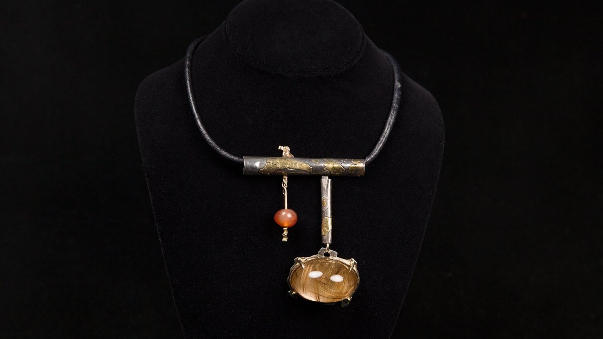 This undated photo provided by the Oakland Museum of California shows the Rutilated Quartz Dome Neckpiece by Florence Resnikoff at the Oakland Museum of California, in Oakland, California, U.S., Oct. 30, 2025.  (AP Photo)