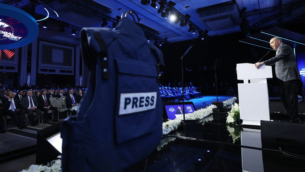 President Recep Tayyip Erdoğan delivers a speech with a press vest displayed nearby on the platform, symbolizing journalists killed by Israel while on duty in Gaza, at the TRT World Forum, Istanbul, Türkiye, Oct. 31, 2025. (AA Photo)