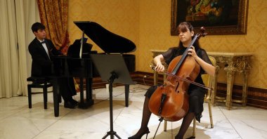 Pianist Batu Meriçtan and cellist Başak Canseli Çiftci perform during a reception hosted by the Turkish Embassy to the Vatican at the Parco dei Principi Hotel, marking the 102nd anniversary of the founding of the Republic of Türkiye, Rome, Italy, Oct. 29, 2025. (AA Photo)