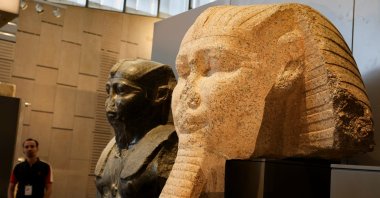 A man looks at exhibits at the Grand Egyptian Museum (GEM), scheduled to officially open on Nov. 1, 2025, following a partial opening last year, Giza, Egypt, June 2, 2025. (Reuters Photo)
