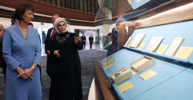 First lady Emine Erdoğan guides Charlotte Merz, wife of German Chancellor Friedrich Merz, through the Presidential Library, explaining the exhibits, Ankara, Türkiye, Oct. 30, 2025. (AA Photo)