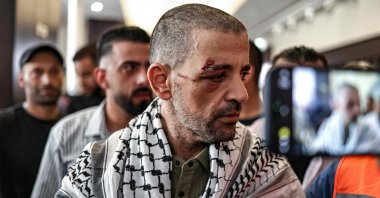 One of the Palestinian prisoners, who was released in a prisoner-hostage swap and cease-fire deal between Israel and Hamas, looks on upon arrival by bus at Ramallah Cultural Centre in Ramallah in the occupied West Bank, Oct. 13, 2025. (AFP Photo)