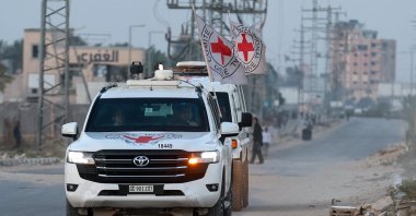 Red Cross transports the body of a deceased hostage, who had been held in Gaza since Oct. 7, 2023, after it was handed over by Hamas as part of a cease-fire and a hostages-prisoners swap deal between Hamas and Israel, in Deir Al-Balah, in the central Gaza Strip, Oct. 30, 2025. (Reuters Photo)