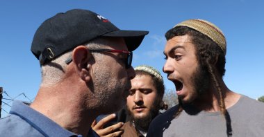 Israeli settlers attack Palestinian farmers and international activists harvesting olives at a farm outside the village of Yabroud and close to an Israeli settler outpost, near Ramallah City, occupied West Bank, Oct. 29, 2025. (EPA Photo)