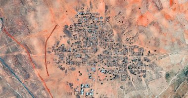 This handout satellite image by Vantor made available on Oct. 31, 2025 shows a general view of a berm construction in Kinin Village near El-Fasher, Sudan, Oct. 15, 2025. (AFP Photo) 