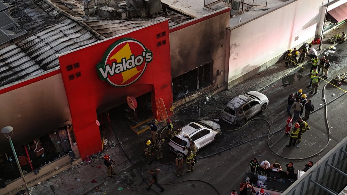 Emergency teams work at the site of a Waldo's discount store following a fire, in Hermosillo, Sonora state, northwestern Mexico, Nov. 1, 2025. (EPA Photo)