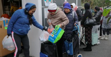 Workers distribute groceries at La Colaborativa’s food pantry, in Chelsea, Massachusetts, U.S., Oct. 29, 2025. (Reuters Photo)