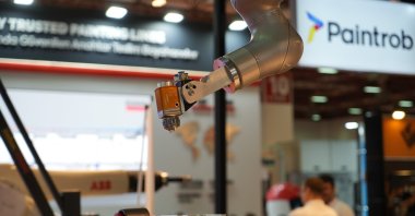 A robotic hand capable of performing coloring activities is seen at an expo, Istanbul, Türkiye, Oct. 1, 2025. (IHA Photo)