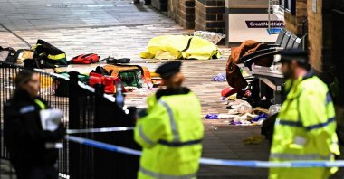 Paramedics medical equipment is pictured in side a police cordon outside Huntingdon Station following a stabbing on a train in Huntingdon, eastern England, Nov. 1, 2025. (AFP Photo)