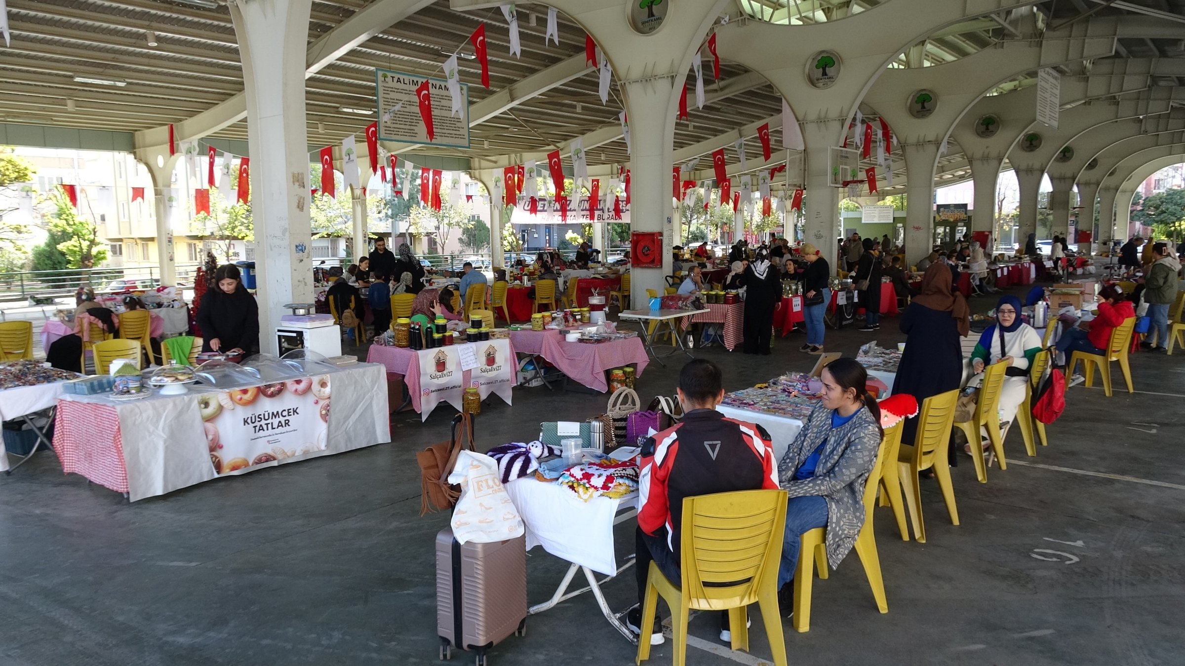 Women display homemade food and handcrafted goods at the Women Producers Market, Gaziantep, Türkiye, Nov. 1, 2025. (IHA Photo)