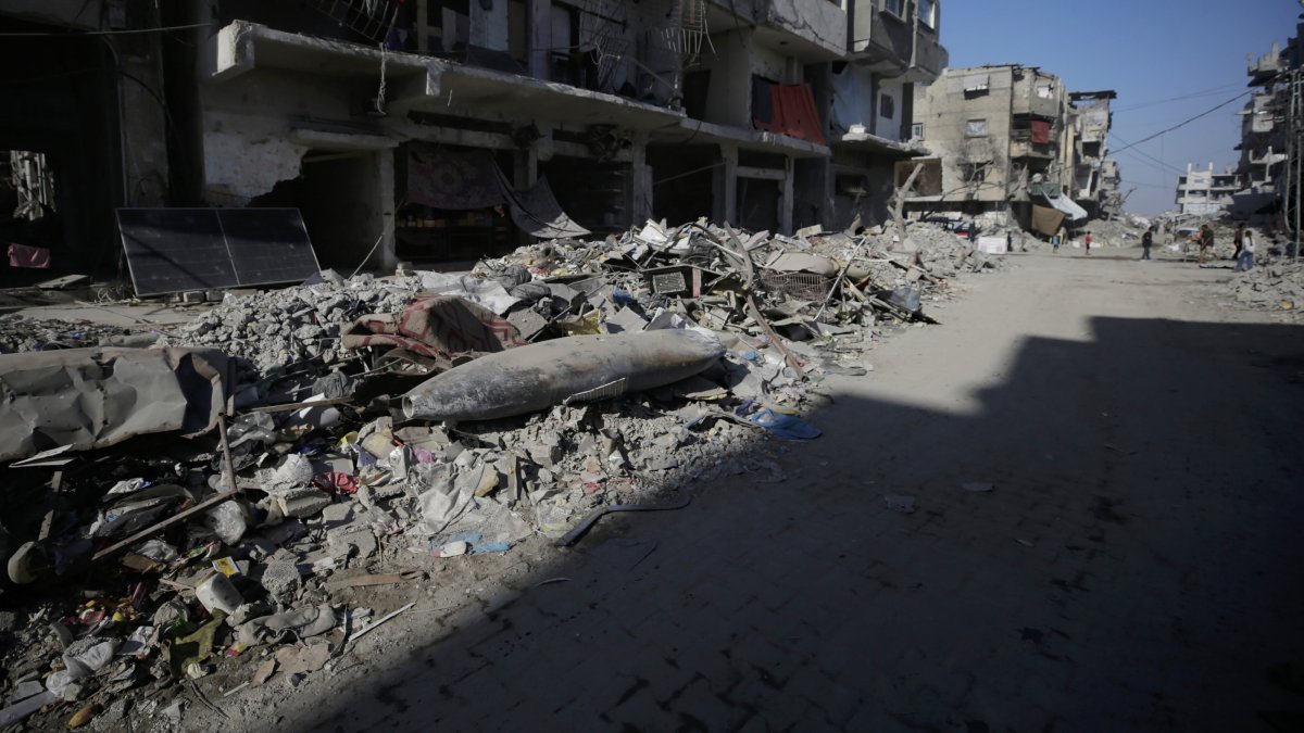 An Israeli missile lies on the rubble in the middle of a street next to Gaza, Palestine, Oct. 30, 2025. (EPA Photo)