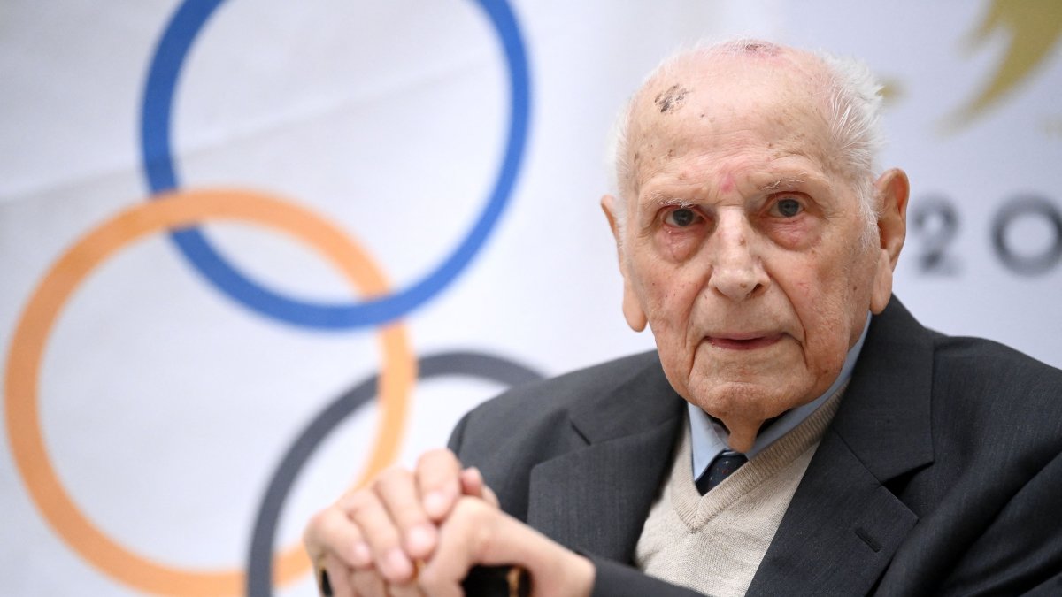 French cyclist and Olympic champion in the team pursuit during the 1948 Summer Olympics in London, Charles Coste, attends a ceremony to receive the Legion d’honneur at the headquarters of the Paris 2024 Organizing Committee for the Olympic and Paralympic Games, in Saint-Denis, Paris, France, April 13, 2022. (AFP Photo)