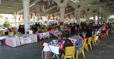 Women display homemade food and handcrafted goods at the Women Producers Market, Gaziantep, Türkiye, Nov. 1, 2025. (IHA Photo)