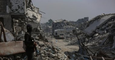 Fighters of the al-Qassam Brigades, the military wing of the Hamas resistance organization, stand guard as they search for the bodies of Israeli hostages alongside the Red Cross, Gaza, Palestine, Nov. 2, 2025. (EPA Photo)