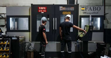 Workers are seen at a machinery manufacturer company operating in Izmir, western Türkiye, Sept. 30, 2025. (AA Photo)